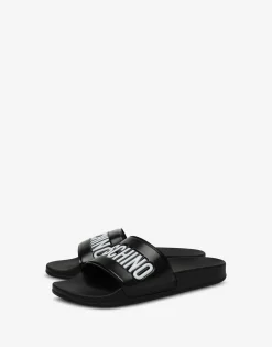 Moschino Sandals & Mules^Rubber pool slides with logo